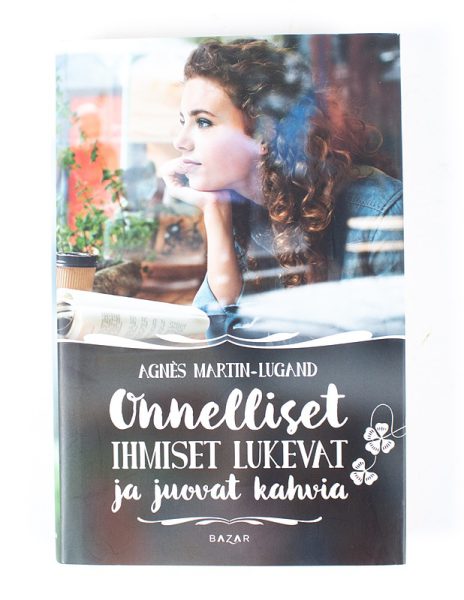 Onnelliset ihmiset lukevat ja juovat kahvia - Kuva 1